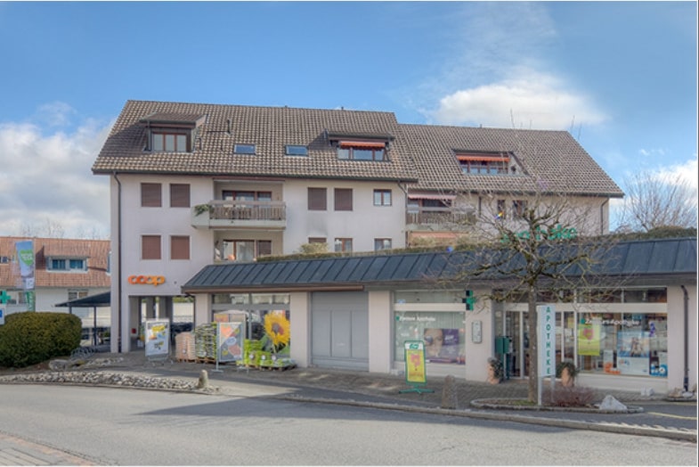 Place de stationnement près du magasin Coop