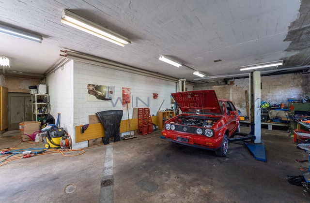 Atelier automobile avec appartement 2,5 pièces
