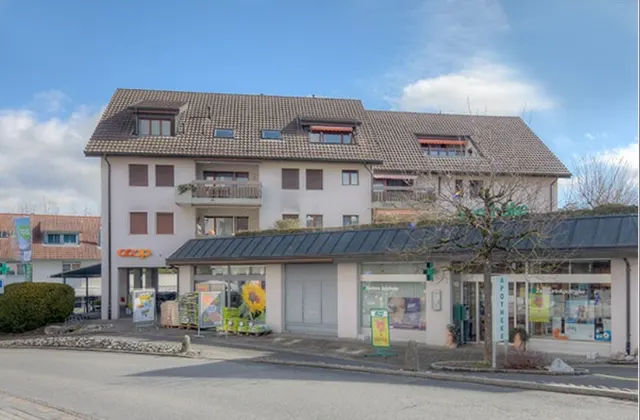 Place de stationnement près du magasin Coop