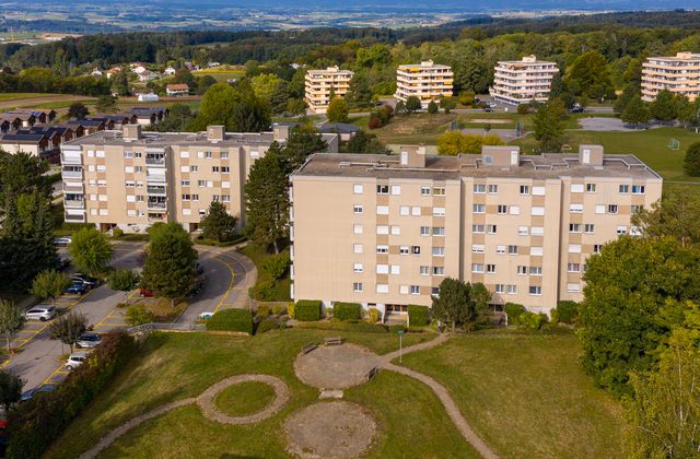 Place de parc à Romanel - Parking intérieur